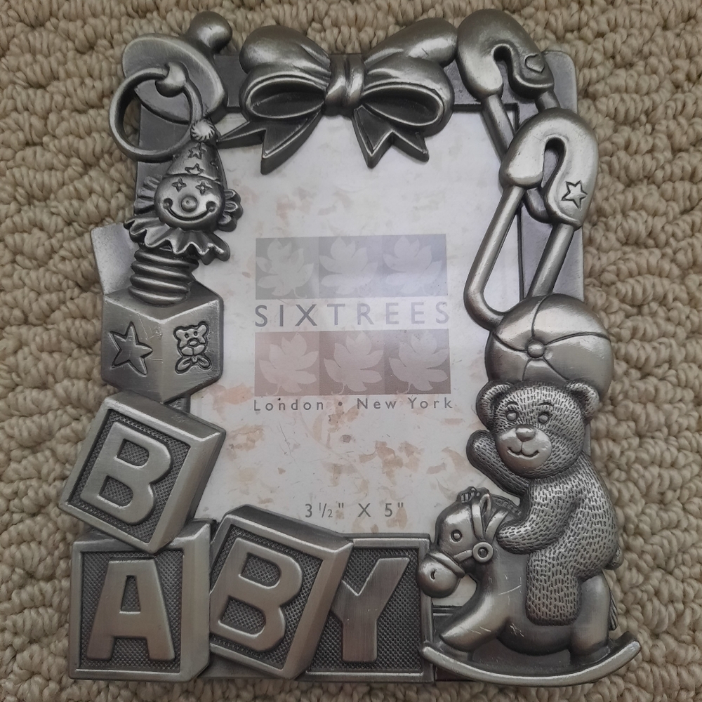Sixtrees silver colored metal baby picture frame, 3 1/2 × 5, preowned